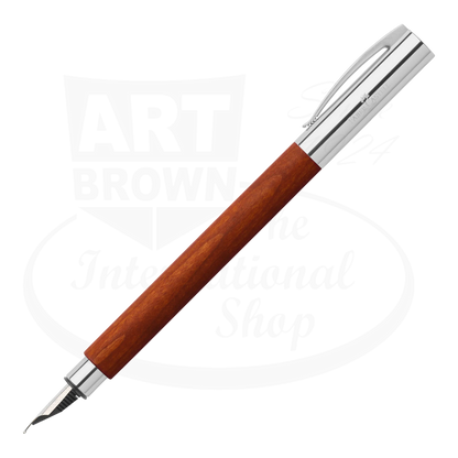 Faber-Castell Ambition Pearwood Fountain Pen with polished chrome cap and warm reddish pearwood barrel