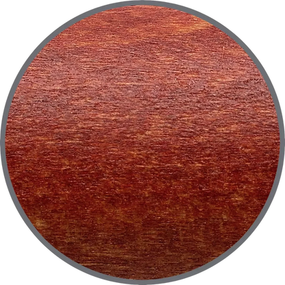 Faber-Castell Ambition Pearwood fountain pen barrel close-up showing reddish natural wood grain texture