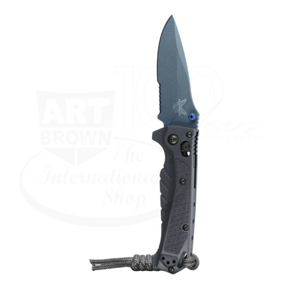 Benchmade Mini Adira folding knife with gray Grivory handle and drop point blade open beside Art Brown logo