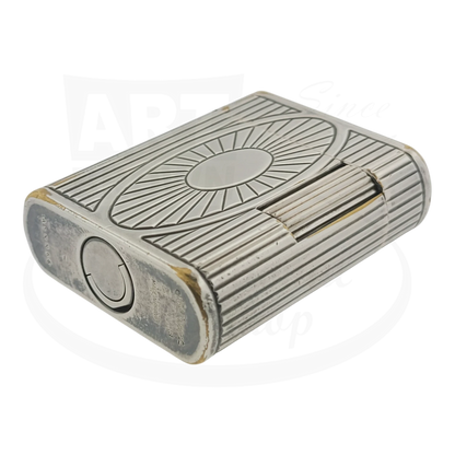 Preowned Vintage S.T. Dupont Soubreny 019105-D1 palladium lighter with sun medallion guilloche design and wear.