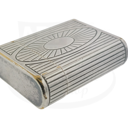 Preowned Vintage S.T. Dupont Soubreny 019105-D1 palladium lighter with sun medallion guilloche and visible wear.