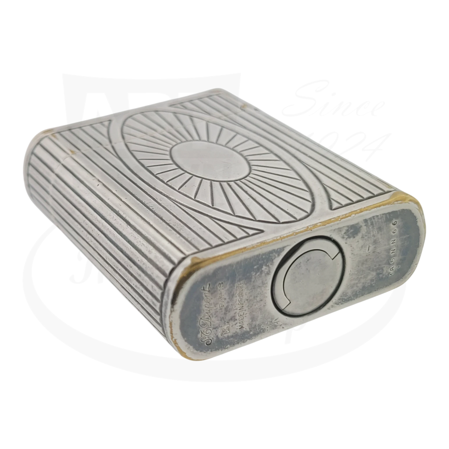 Preowned Vintage S.T. Dupont Soubreny 019105-D1 Palladium lighter with Sun Medallion, guilloche design, visible wear and discoloration.