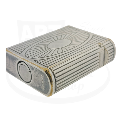 Preowned Vintage S.T. Dupont Soubreny 019105-D1 palladium lighter with sun medallion and visible wear on plating