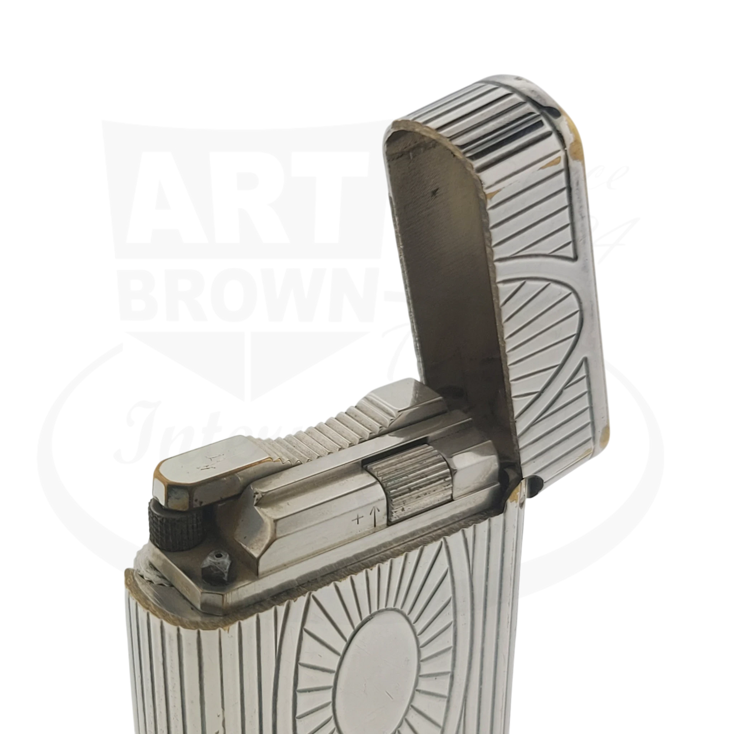 Preowned Vintage S.T. Dupont Soubreny 019105-D1 palladium lighter with sun medallion engraving and visible wear.