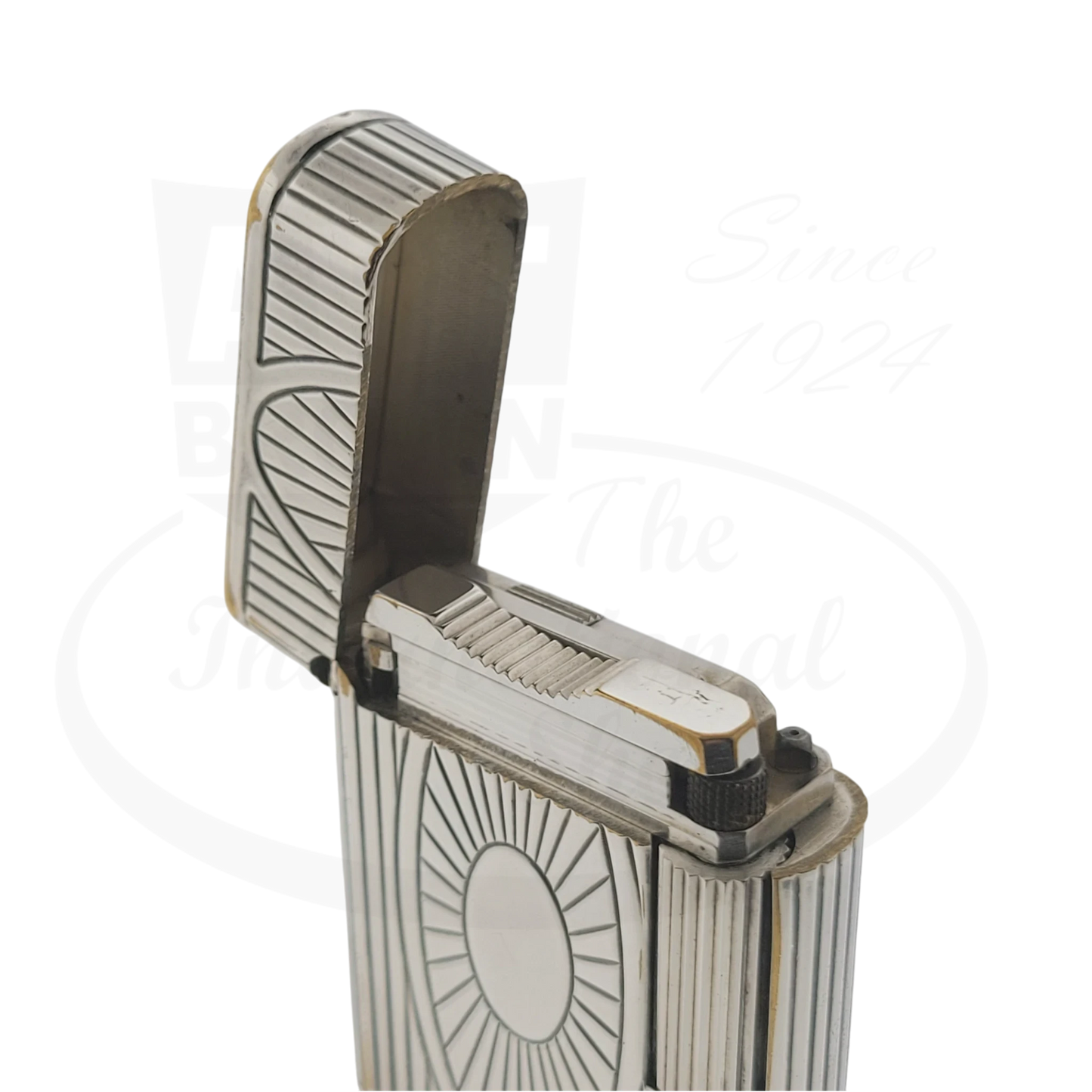 Preowned Vintage S.T. Dupont Soubreny 019105-D1 palladium lighter with Sun Medallion and chipped plating detailing