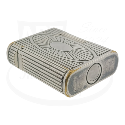 Preowned Vintage S.T. Dupont Soubreny 019105-D1 palladium lighter with sun medallion guilloche and visible wear