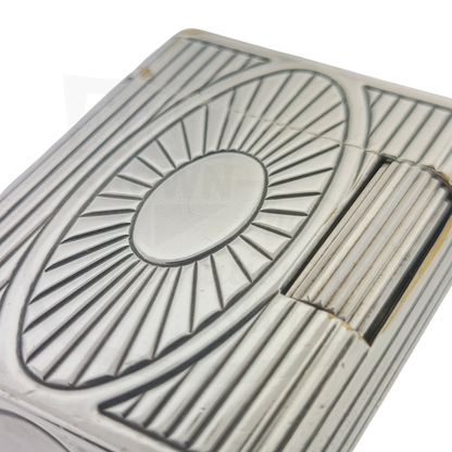 Preowned Vintage S.T. Dupont Soubreny 019105-D1 palladium lighter with sun medallion and vertical fluting, showing wear