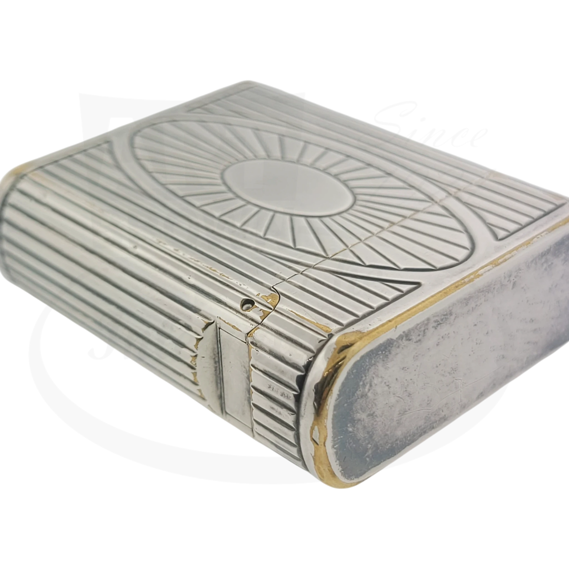 Preowned Vintage S.T. Dupont Soubreny 019105-D1 palladium lighter with sun medallion guilloche and visible wear