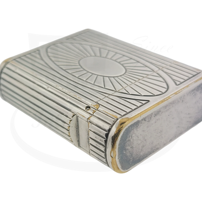 Preowned Vintage S.T. Dupont Soubreny 019105-D1 palladium lighter with sun medallion guilloche and visible wear