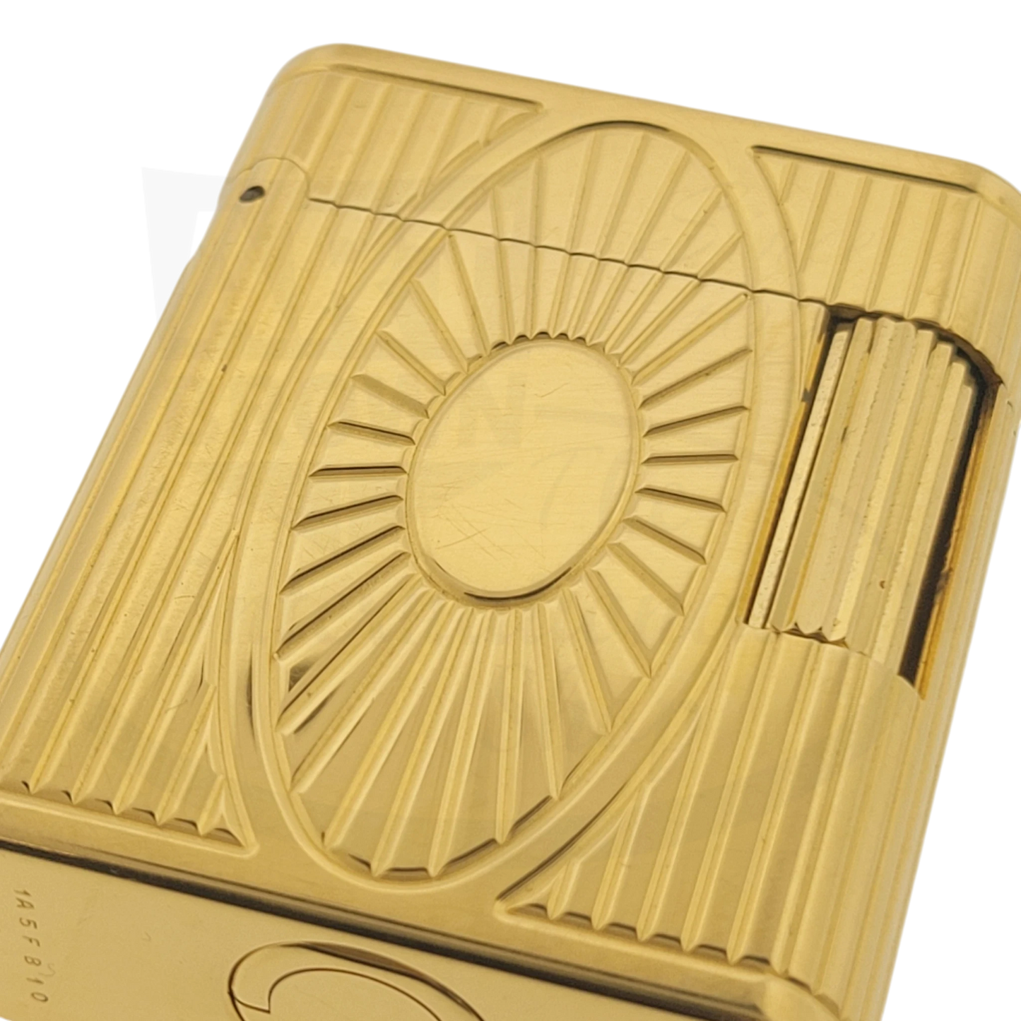 S.T. Dupont Soubreny 019205-D1 gold plated vintage lighter with guilloche sun medallion and vertical fluting design