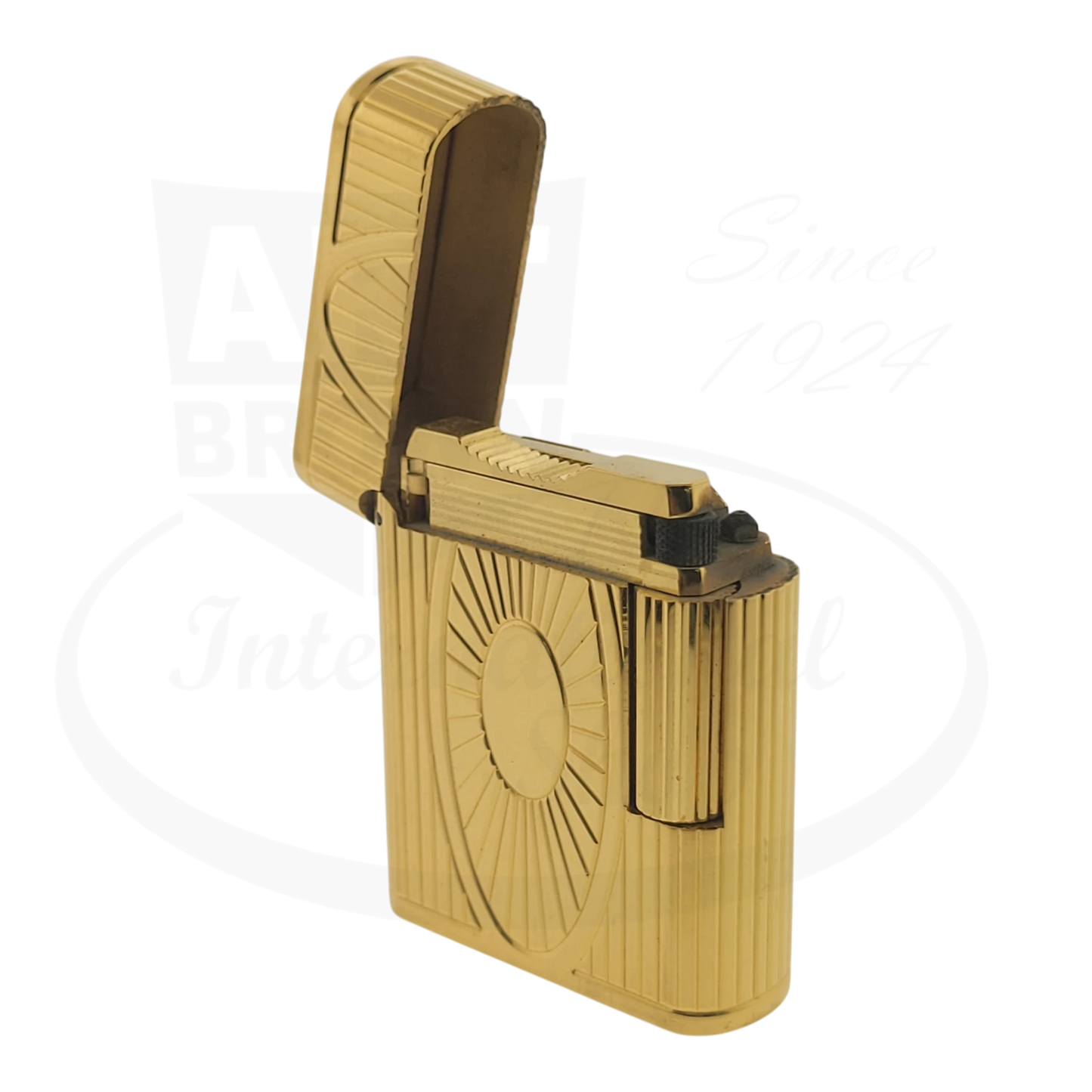 Preowned Vintage S.T. Dupont Soubreny Gold Sun Medallion 019205-D1 gold plated lighter with guilloche design