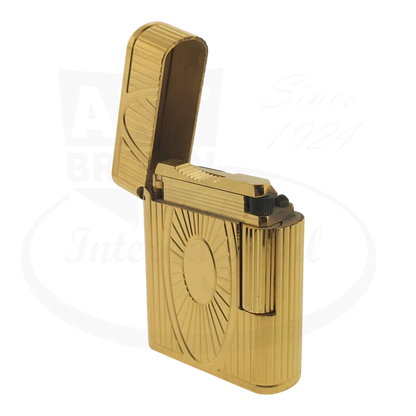 Preowned Vintage S.T. Dupont Soubreny Gold Sun Medallion 019205-D1 gold plated lighter with guilloche design