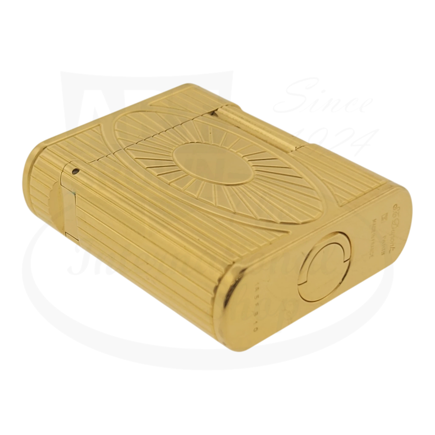 S.T. Dupont Soubreny 019205-D1 gold plated lighter with sun medallion guilloche and vertical fluting design