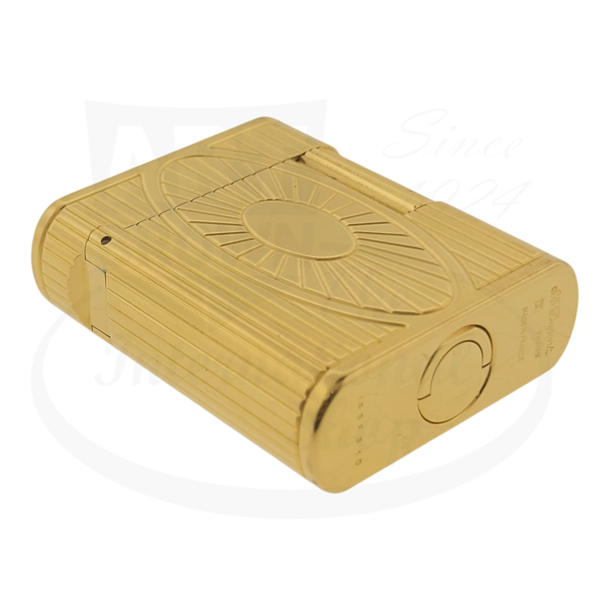 S.T. Dupont Soubreny 019205-D1 gold plated lighter with sun medallion guilloche and vertical fluting design