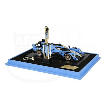 Luxury blue racing car model with a matching pen displayed on a sleek black and blue base collection set