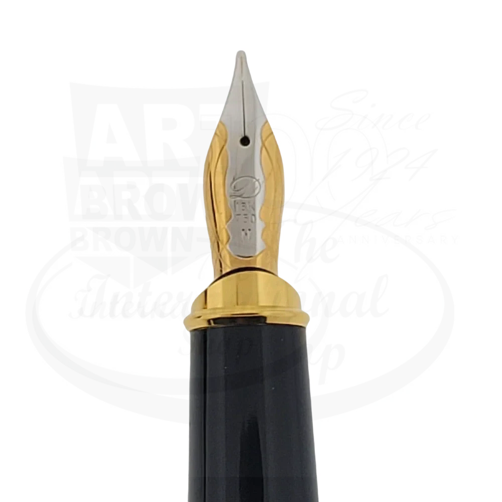 Detailed view of the 18-karat gold nib of the S.T. Dupont Olympio Extra Large Fountain Pen, with ornate engraving.