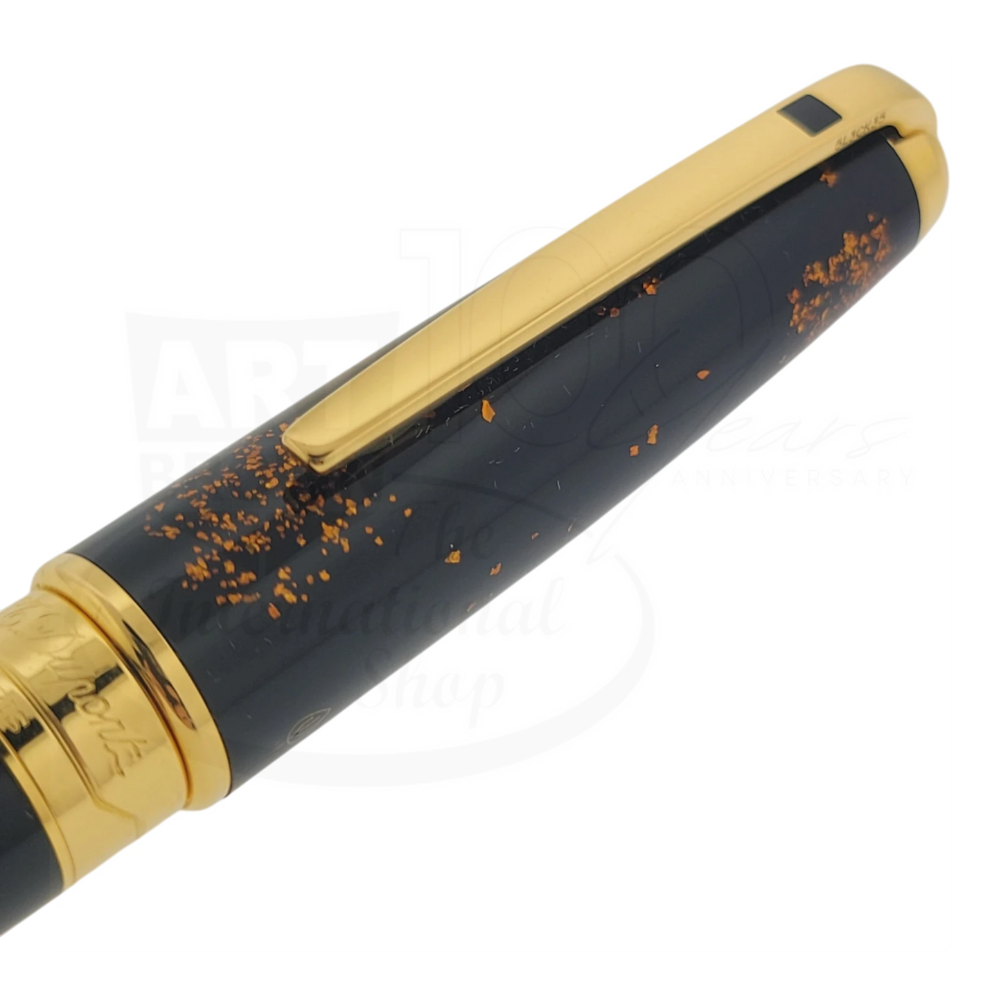 S.T. Dupont Olympio 482590 large rollerball pen with black lacquer and scattered gold dust accents, polished gold clip