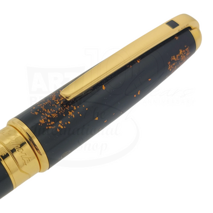S.T. Dupont Olympio 482590 large rollerball pen with black lacquer and scattered gold dust accents, polished gold clip