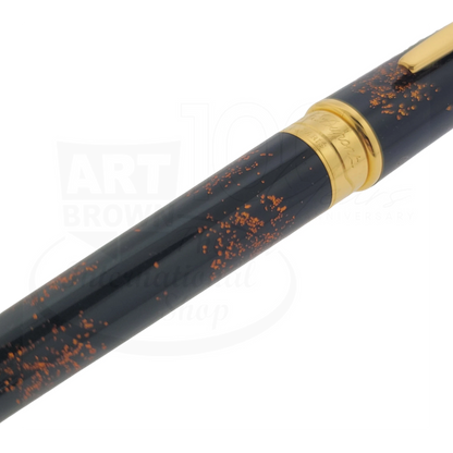 S.T. Dupont Olympio 482590 rollerball pen with deep black resin and gold dust finish, polished gold trim close-up