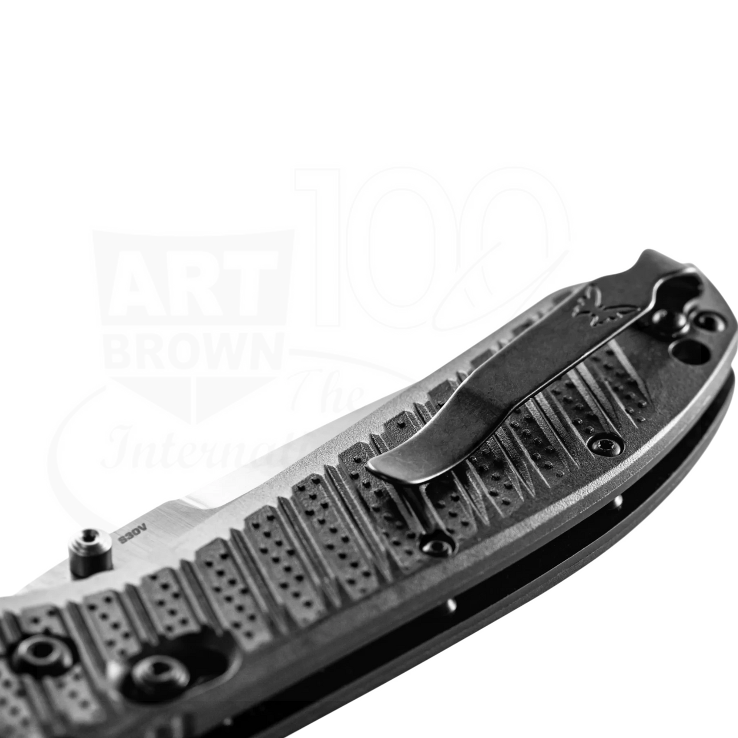 Benchmade Presidio® II CF-Elite® Drop point folding knife close-up with textured handle and branded clip