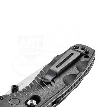 Close-up view of Benchmade Mini-Barrage® Black Valox® Assist Drop Point showing textured handle and black pocket clip 