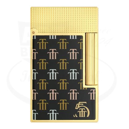 Front view of the S.T. Dupont Ligne 2 Trinidad lighter with gold and black design.