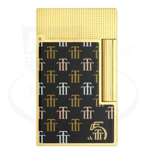 Front view of the S.T. Dupont Ligne 2 Trinidad lighter with gold and black design.