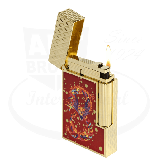 S.T. Dupont Ligne 2 C16526 gold-plated lighter with burgundy lacquer panel featuring dragon artwork, textured diamond pattern, lit flame display