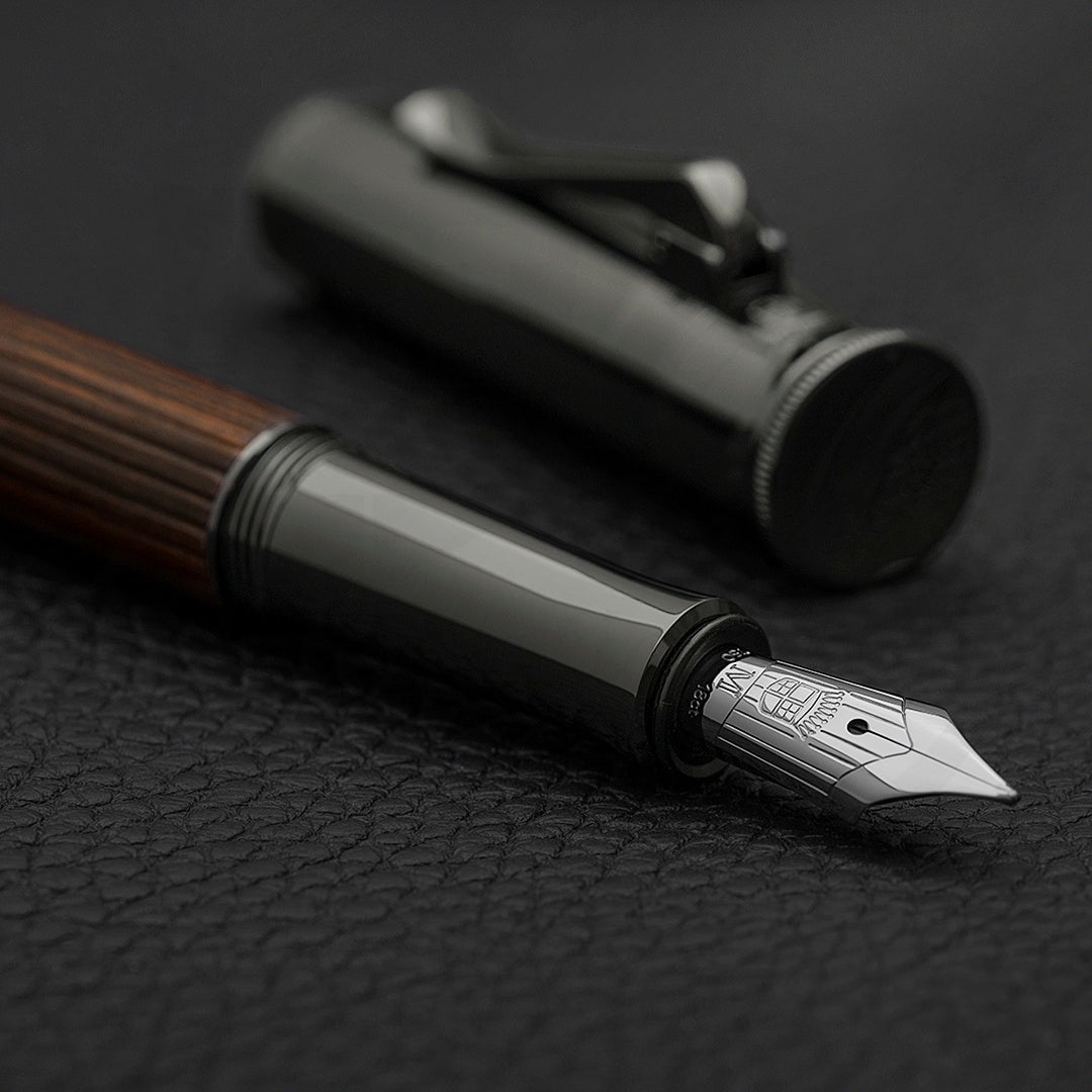Graf von Faber-Castell Classic Macassar Fountain Pen finely fluted Macassar wood barrel with silver nib and black cap