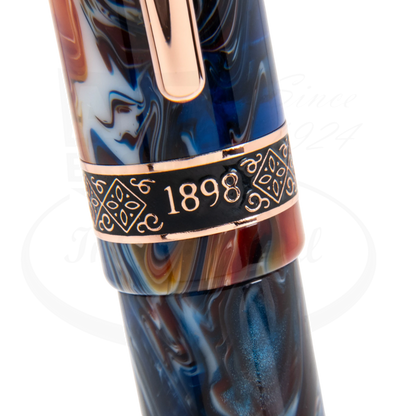 Conklin 1898 Misto Orange Rollerball Pen CK73278 marbled resin in orange and blue with rose gold trim close-up section