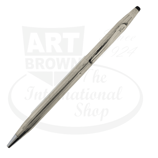 Cross Sterling Silver Ballpoint Pen with slim profile, tarnished metallic barrel, scratched surface, retractable tip mechanism