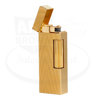 Dunhill Rollagas gold moire lighter in gold-plated brass with engraved texture and open lid showing ignition wheel