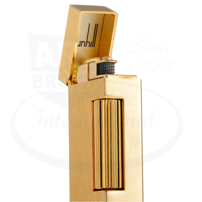 Dunhill Rollagas Gold Moire lighter gold-plated brass with moiré pattern and open lid showing wheel ignition mechanism