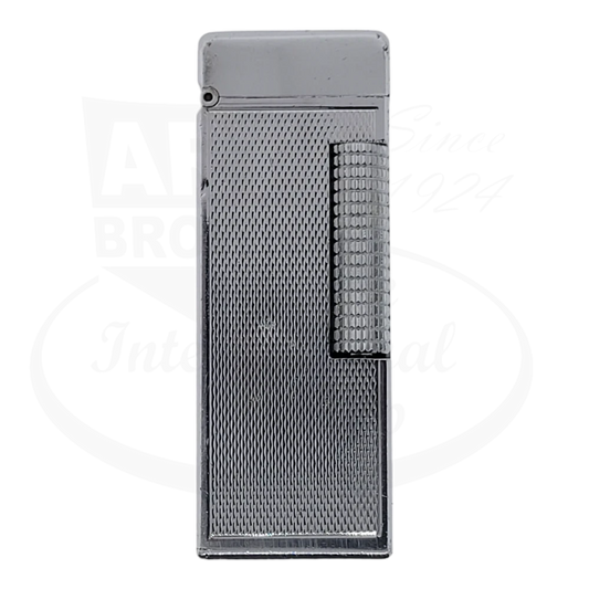 Dunhill Anomalies silver-plated barley pattern lighter with textured surface, flint wheel mechanism, and vintage patina showing distinct dents and wear marks