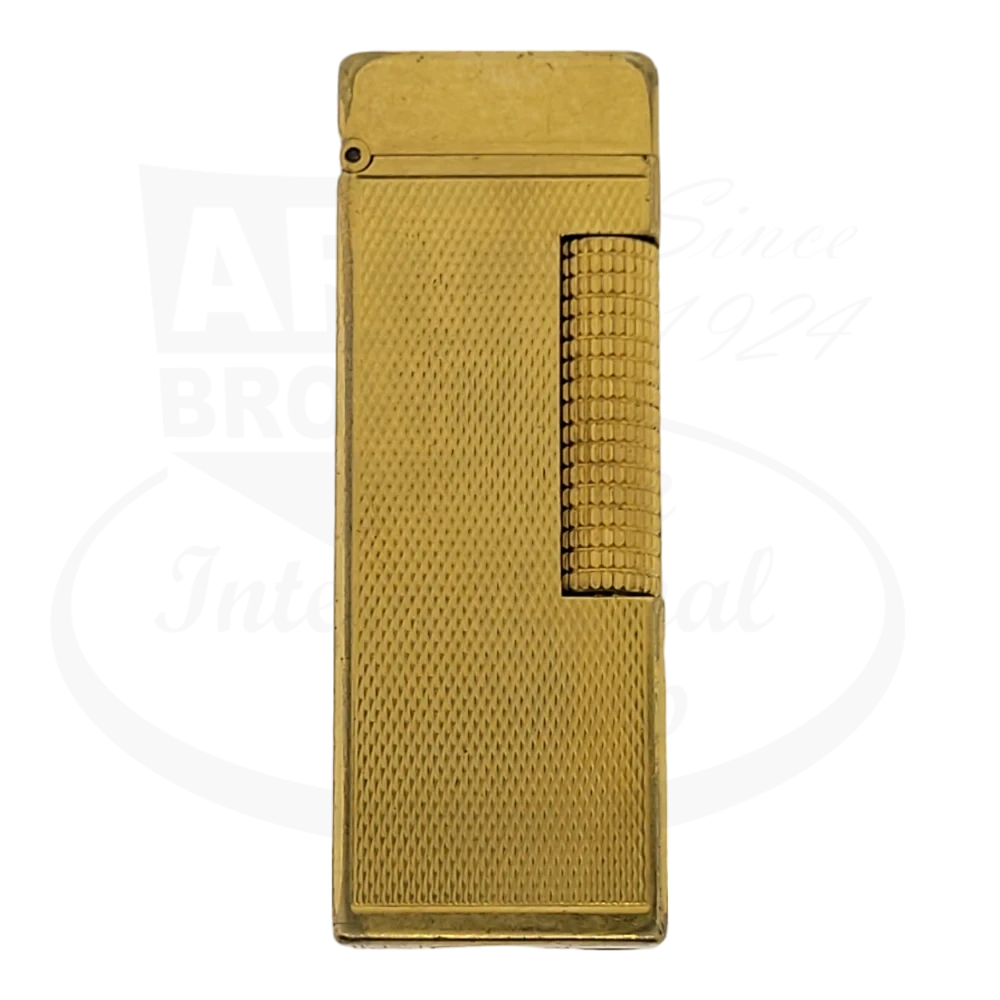 Dunhill Anomalies lighter with gold plating and barley grain design seen from the front.