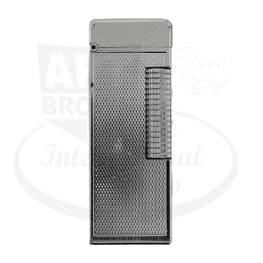 Dunhill B63 vintage silver-plated barley grain lighter featuring textured surface pattern, ribbed flint wheel, and visible wear marks in rectangular form