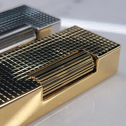 Dunhill Rollagas Hobnail Lighter close-up showing gold hobnail surface and flint wheel detail, gallery position 6 square image