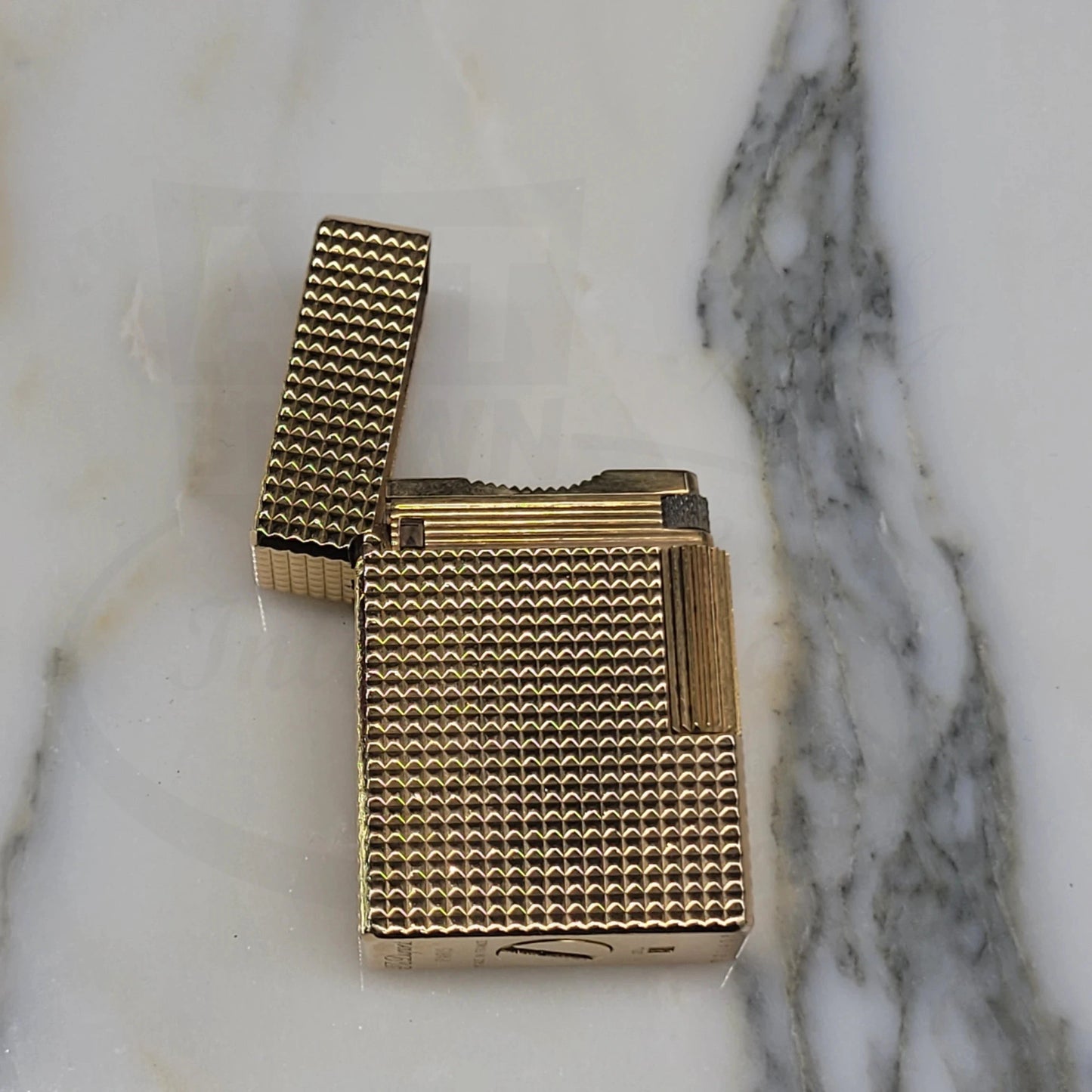 Preowned Vintage S.T. Dupont Ligne 1 Small BS Gold Diamondhead 012110-D2 gold plated lighter with textured pattern