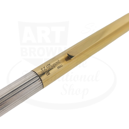 Close up of S.T. Dupont engraving and hallmarks on two-tone Classique ballpoint pen.