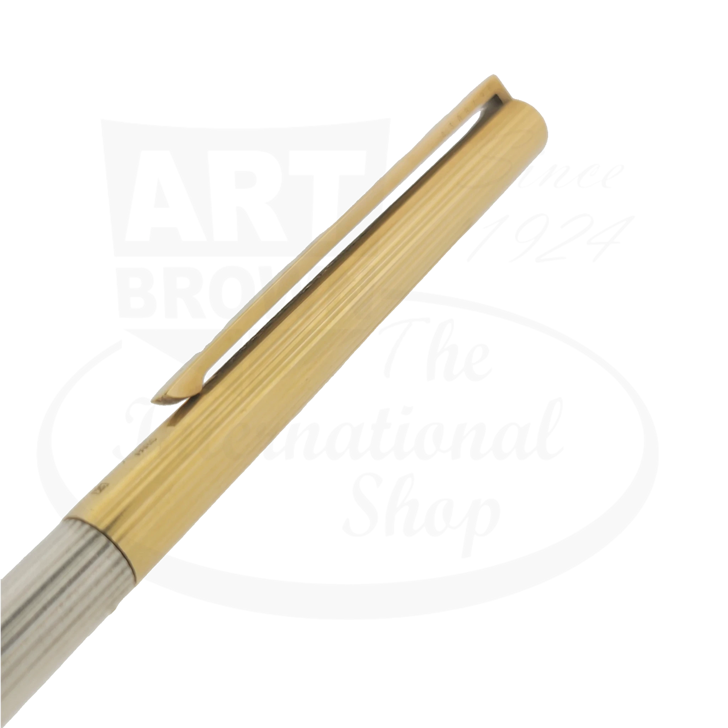 Close up detail of the cap and clip of two-tone S.T. Dupont classique ballpoint pen.