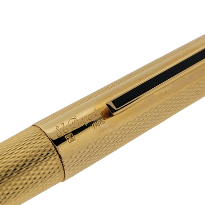 S.T. Dupont Classique rollerball pen close up with gold barley grain texture black lacquer inlay and engraved Paris