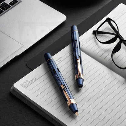 Nahvalur Eclipse Cobalt & Rose Gold Medium Fountain Pen made of aluminum with rose gold trim and steel nib on notebook.