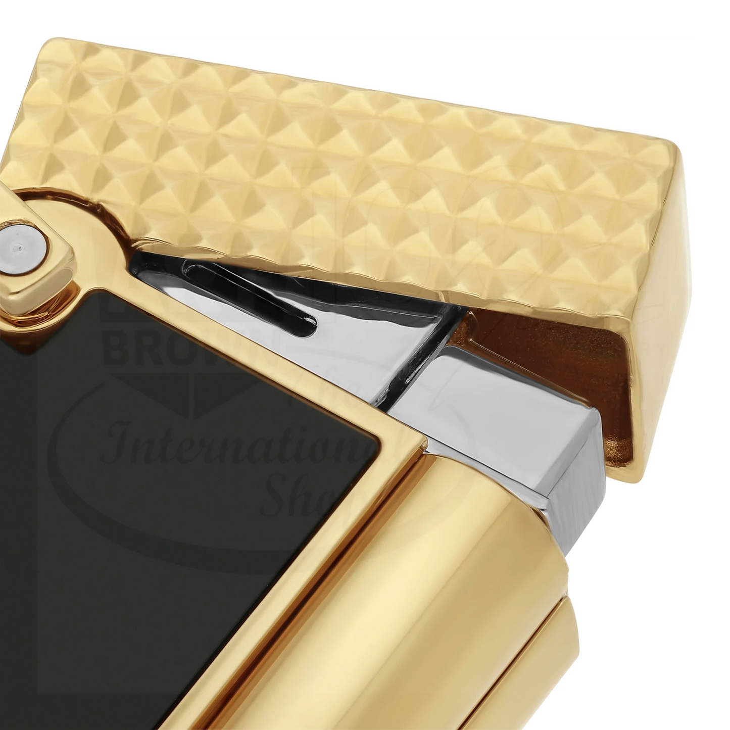 S.T. Dupont Ligne 2 lighter with black lacquer panel, gold-tone guilloche lid, and soft flame mechanism close-up