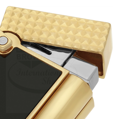 S.T. Dupont Ligne 2 lighter with black lacquer panel, gold-tone guilloche lid, and soft flame mechanism close-up