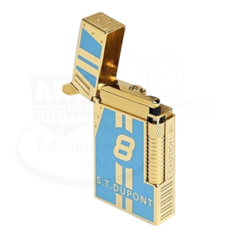 Luxury gold and blue cigar lighter with racing number 8 and S.T. Dupont branding, inspired by Le Mans prestige set