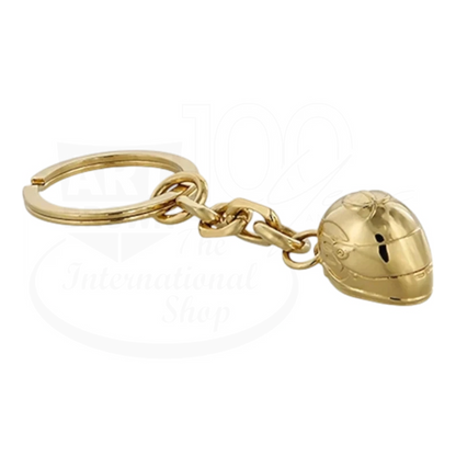 Gold-toned keychain featuring a detailed miniature racing helmet with polished finish and chain links