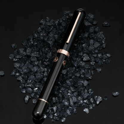 Nahvalur Nautilus Cephalopod Rose Gold Medium Fountain Pen, ebonite body, rose gold trim, porthole ink windows.