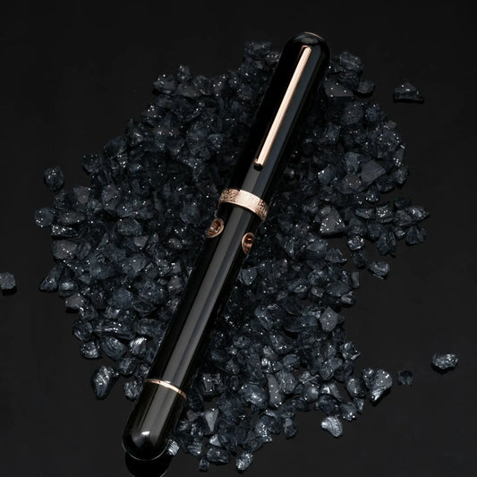 Nahvalur Nautilus Cephalopod Rose Gold Medium Fountain Pen, ebonite body, rose gold trim, porthole ink windows.