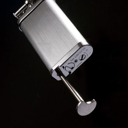 IM Corona 4th Generation Old Boy Antique Brass Heritage Pipe Lighter close up of tamper tool in silver finish square orientation