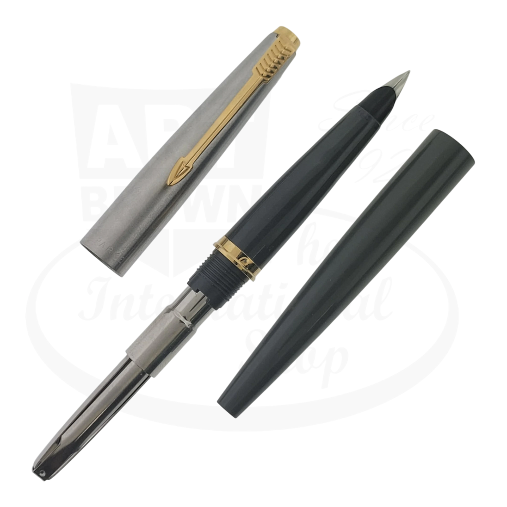 Parker 45 vintage fountain pen, showing grey barrel and grip, silver and gold cap, and internal filling system.